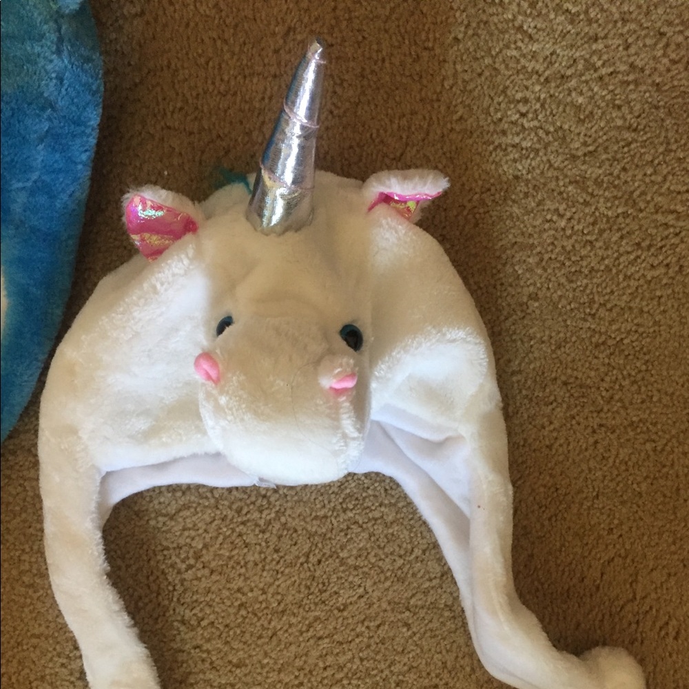 Pair of unicorn winter hats